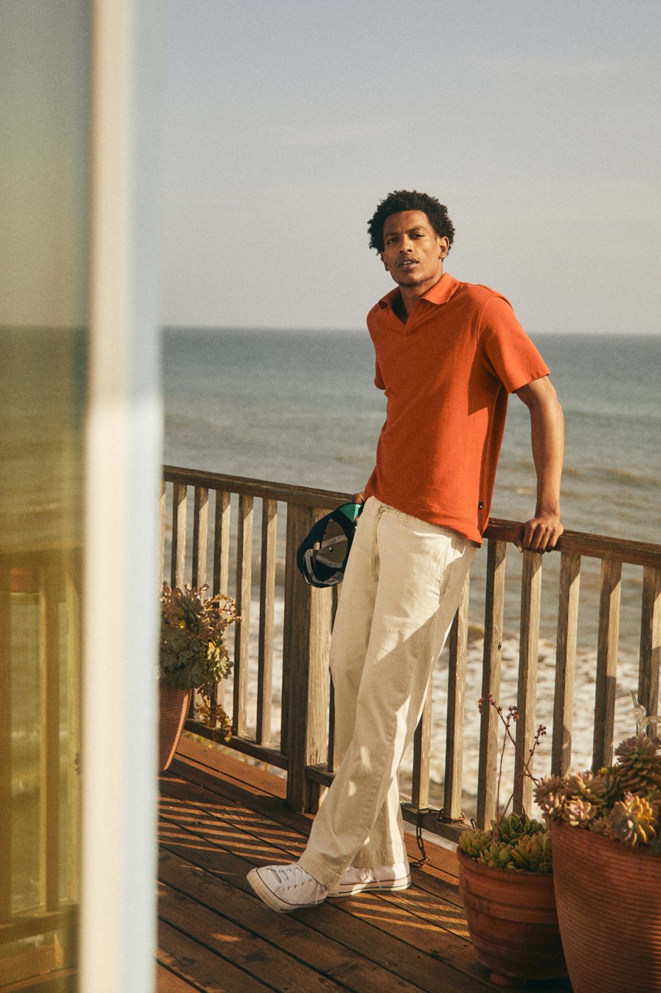 Jordan Roach on location by the ocean